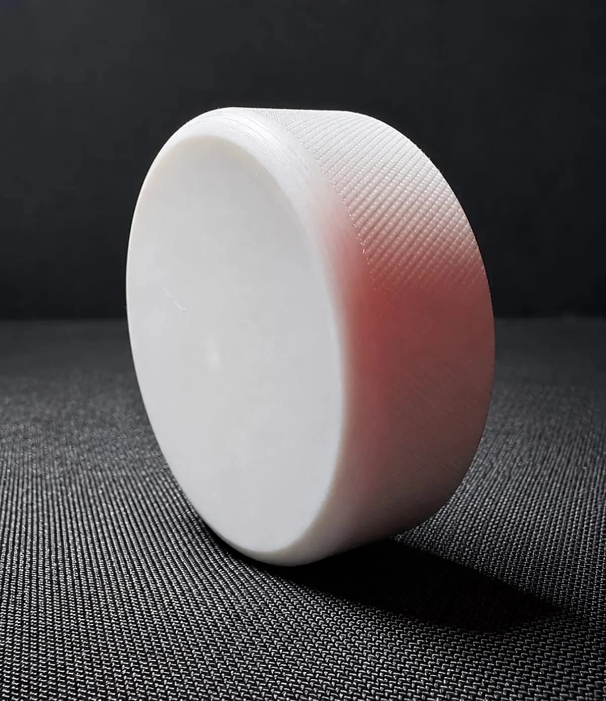 The Danglemat puck on the mat surface
