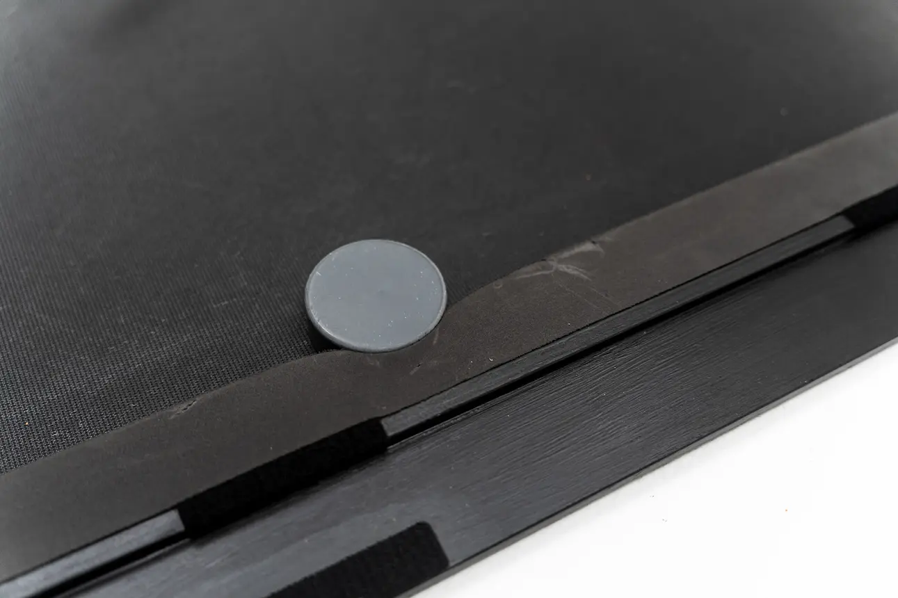 A puck bouncing off a Danglemat bumper